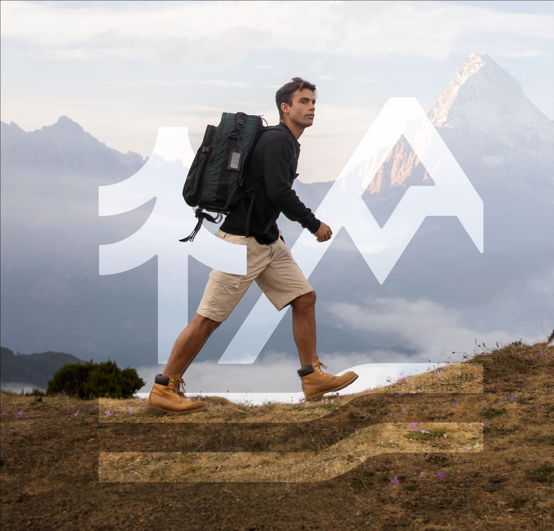 A hiker on a mountain trail