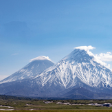 Kliuchevskoy, the highest stratovolcano of Eurasia, partly hidden behind Kamen, Kliuchevskoi