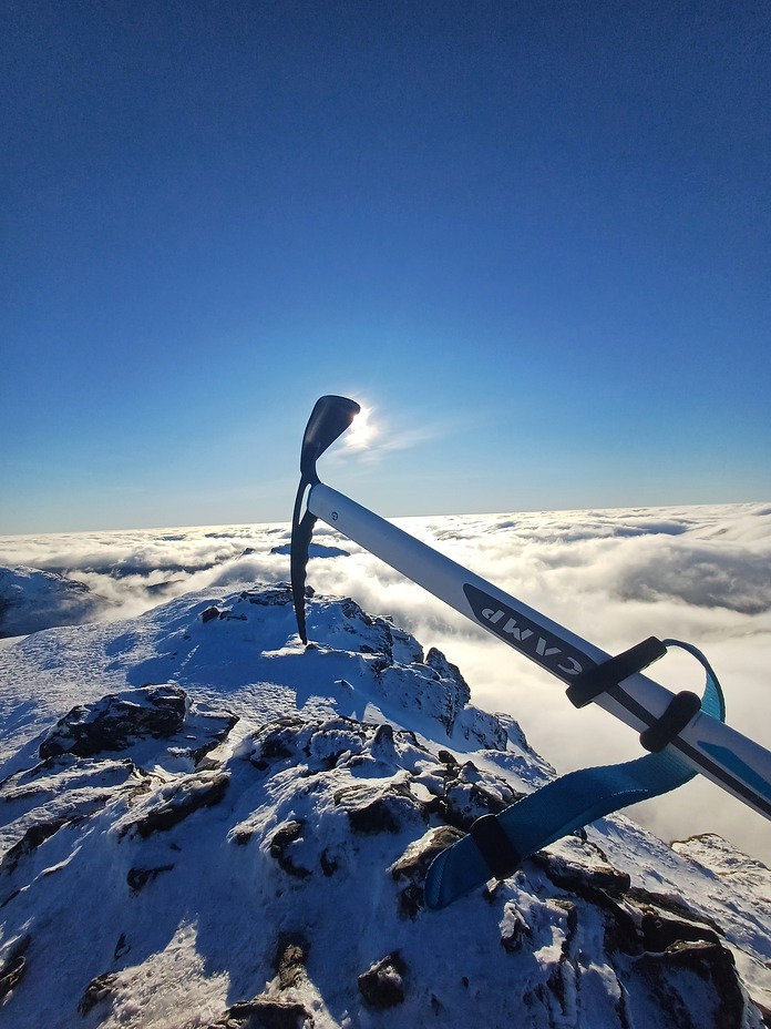 Standing on Beinn Ime summit