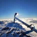 Standing on Beinn Ime summit